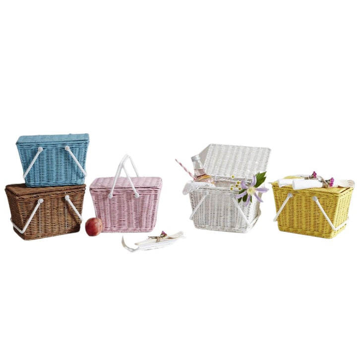 Olli Ella Piki Rattan Picnic Basket - Rattan picnic baskets, lines up in a row, of various colors, including mint, straw, natural, white, and yellow- Baskets - Oompa Toys