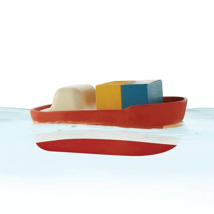 PlanToys Cargo Ship Bath Toy floating in water